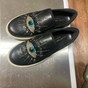 Kurt Geiger Black Sneakers with Eye Embellishment